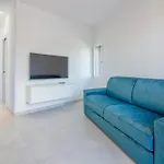 Guesthost - Elegant Beachfront Wi-fi & Parking